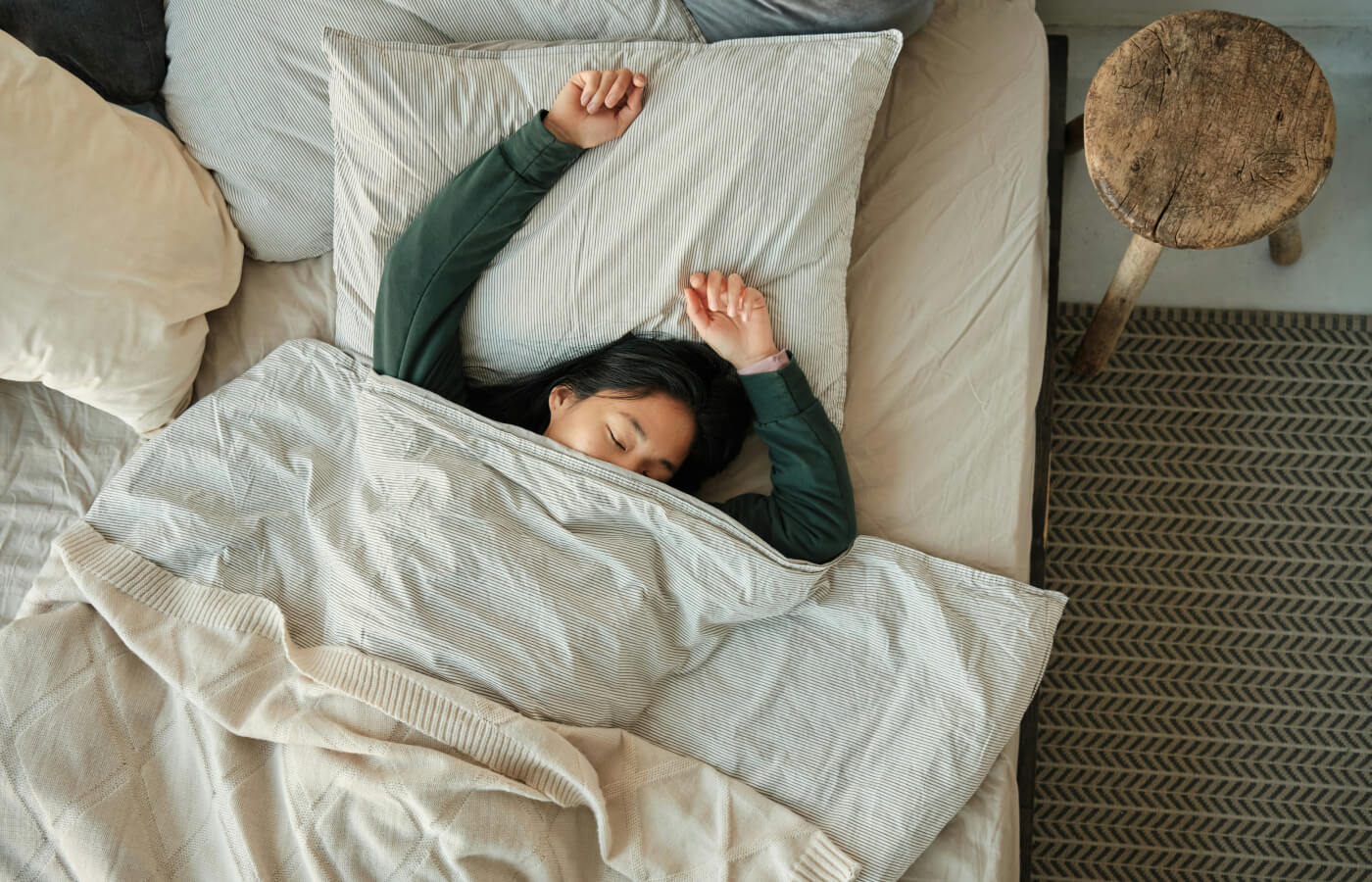 Person sleeping in bed