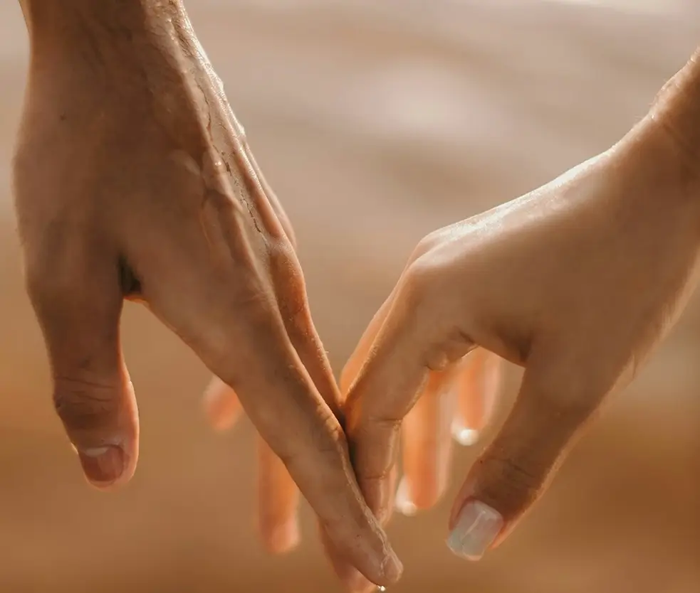 Close up of a couple holding hands