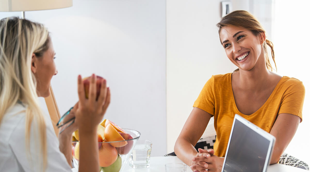 Woman smiling with medical provider